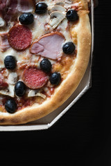 Pizza in a box . Pizza for take away.