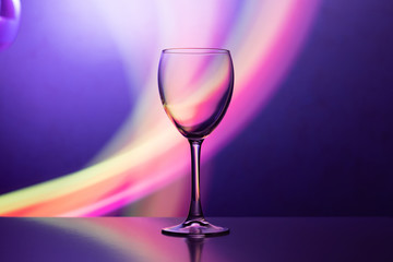 Wine glass in the club light night on weekends and holidays