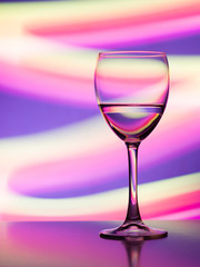 Wine glass in the club light night on weekends and holidays