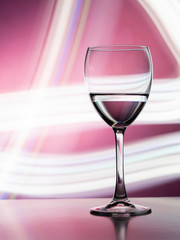 Wine glass in the club light night on weekends and holidays