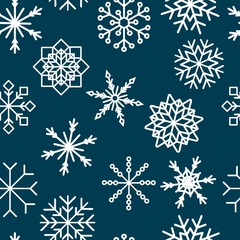 Seamless pattern with hand drawn snowflakes. Abstract brush strokes. Ink illustration. Winter pattern for wrapping paper.