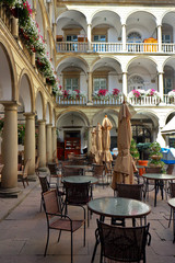 View of Italian courtyard loggia arcade of the Korniakt palace (kamienica Królewska) on old town in the center of Lvov © watcherfox