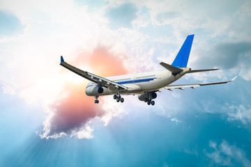 Airplane flying in the blue sky