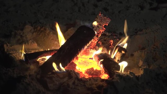 campfire on beach in kill devil hiss nc