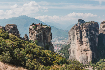 Mountain scenery with Meteora rocks and Roussanou Monastery, landscape place of monasteries on the rock.