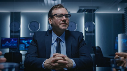 Portrait Shot of Chairman of the Board of Directors Making a Speech For His Business Partners and Gives Orders to His Subordinates on the Weekly Meeting. Politician Talks with His Advisors