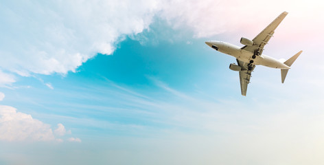 Airplane flying in the blue sky