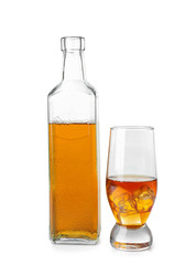 Bottle and glass of whisky on white background