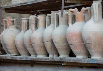 Vessels, pots and a variety of artifacts surviving eruption of Vesuvius in Pompeii  have been...