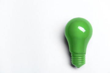 Painted light bulb on white background