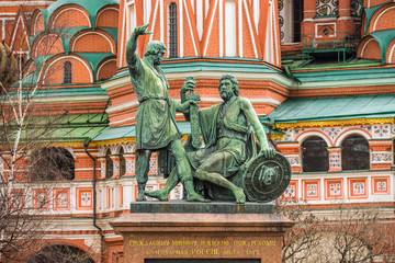 Fototapeta na wymiar Statue of Kuzma Minin and Dmitry Pozharsky in front of St. Basil Cathedral.