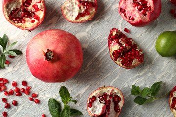 Ripe pomegranates on light background