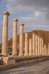 Ruins of the roman period in Beit She'An in Galilee in Israel, the hill on the background is the tell from the canaanite period