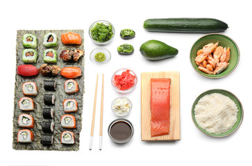 Fototapeta na wymiar Composition with tasty sushi on white background