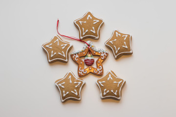star-shaped flat lay of Homemade Christmas Cookies and decorative star 