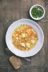 White plate of homemade vegetable soup