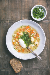 White plate of homemade vegetable soup