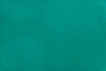 Green blue grunge wall texture background, painted aquamarine wall