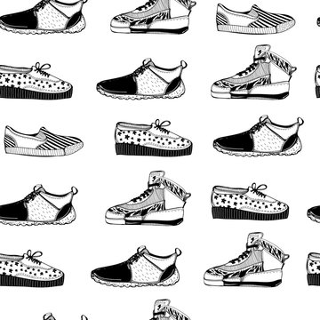 Various hand drawn sneakers and shoes. Graphic vector seamless pattern