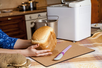 Hostess keeps fresh bread from electric bread maker