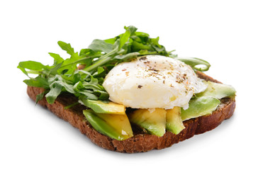 Tasty toast with avocado, egg Benedict and arugula on white background