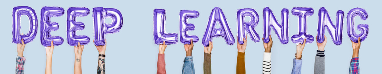Hands holding deep learning word in balloon letters