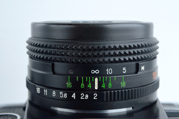Fototapeta na wymiar Retro lens made of metal and glass close up Selective focus