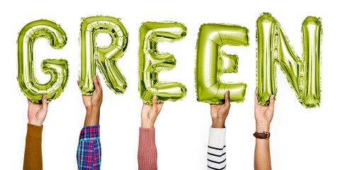 Hands showing green balloons word