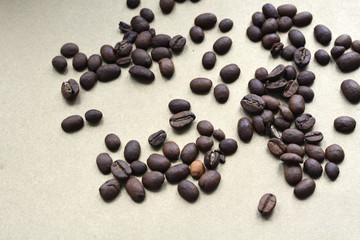 brazilian coffee grains on beige background
