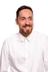 Fototapeta premium Stylish bearded business man smiling to camera, having pleased expression and cheerful look.
