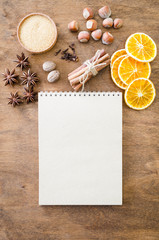 Obraz na płótnie Canvas Notebook for writing recipe or menu. Culinary background.