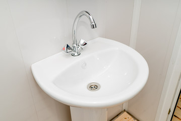 The photo of a sink in a bathroom