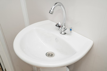 The photo of a sink in a bathroom