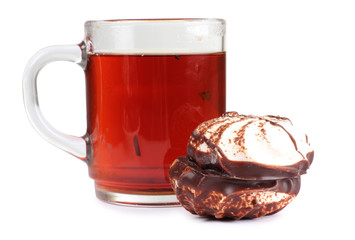 Biscuits and a cup of tea on white background