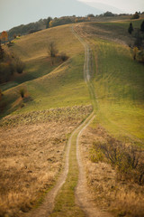 Wonderful mountain under the sunlight. caskade mountains hills off the road at sunset. impressively beautiful background of nature. Traveling is a way of life. The idea of an adventure lifestyle.