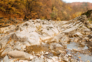 Mountain river water landscape. Wild river in the mountains. River view overlooking the wild river. Autumn in the mountains
