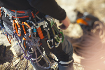 Climbing gear and equipment closeup. Tilt-Shift effect.