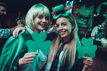 Friends celebrating a Saint Patrick's Day at pub