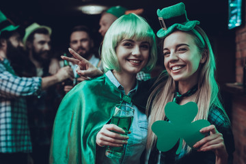 Friends celebrating a Saint Patrick's Day at pub