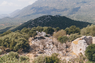 Fototapeta na wymiar Old stone in Apollonia ruins in Lycian Way, Antalya, Turkey