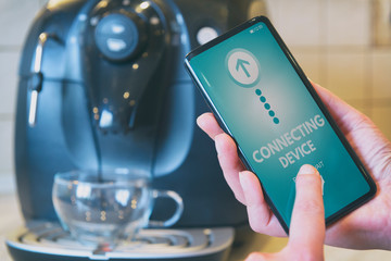 Connecting coffee machine with smart phone - obrazy, fototapety, plakaty