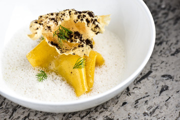 Fine dining, open Italian ravioli with Porcini mushrooms