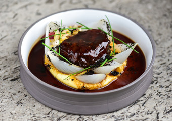 Haute cuisine, grilled Lamb steaks with a sauce of port, and vegetable