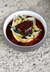 Haute cuisine, grilled Lamb steaks with a sauce of port, and vegetable