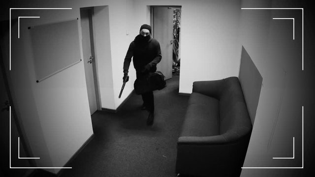 Undefined thieves escaping from place of crime, armed robbery, CCTV effect