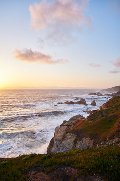Waves by cliffs in Big Sur, USA