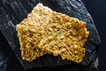 Stack of fresh and tasty homemade seed crackers.