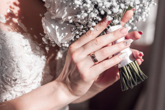 Image of wedding bouquet in bride's hands