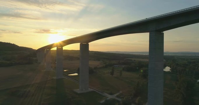 Aerial shot of M7 motorway Viaduct in Hungary at sunset with lake Balaton in view