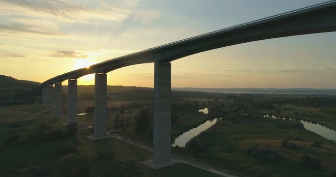 Aerial shot of M7 motorway Viaduct in Hungary at sunset with lake Balaton in view